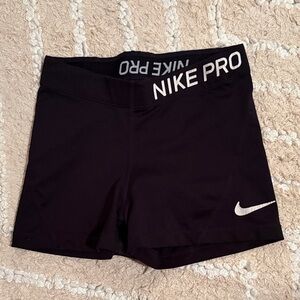 Nike Pro Women's Black Athletic Compression Shorts with White Swoosh